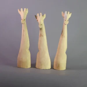 Wooden giraffe heads